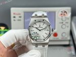 High Quality Replica AUDEMARS PIGUET Royal Oak White Leather Strap White Grande Tasserie Grid Pattern Face Dial Silver Hexagonal Screw Fixed Case Watch 33mm